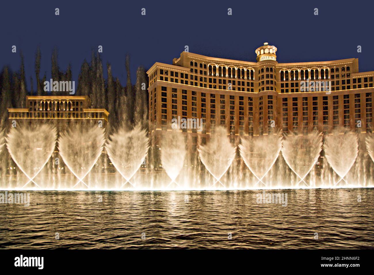 Las Vegas Bellagio Hotel Casino, featured with its world famous fountain show, at night with fountains  in Las Vegas, Nevada Stock Photo