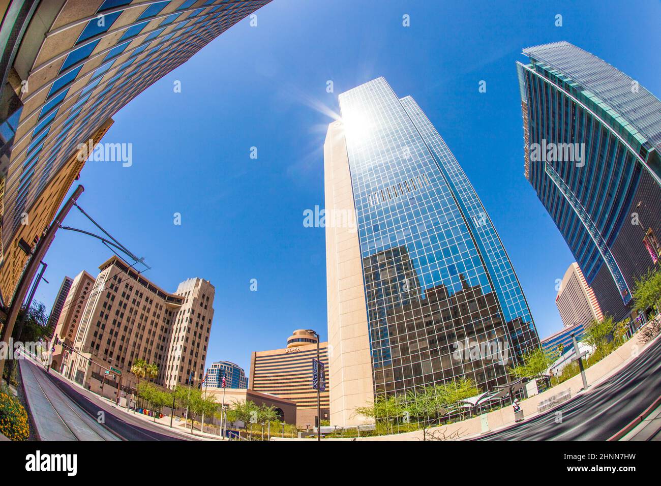 perspective of skyscrapers downtown at central avenue in Phoenix. Central Avenue represents almost every architectural use and style found in Phoenix Stock Photo