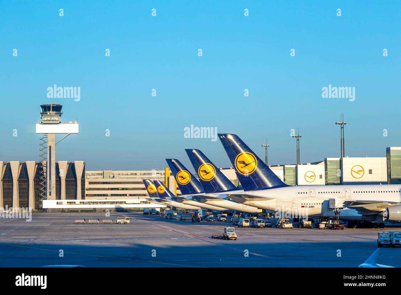 Lufthansa fleet is grounded due to corona crises. The picture symbolizes grounded aircrafts at the gate. Stock Photo