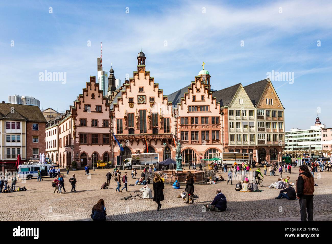 people visit the roemer, the central square in Frankfurt with town hall view Stock Photo