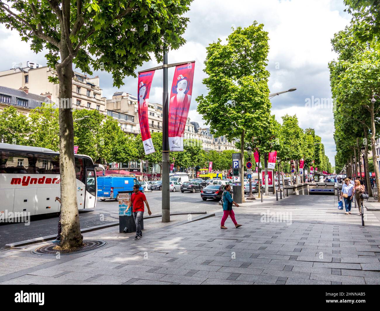 people-walking-and-visiting-the-famous-street-in-paris-the-champs-d