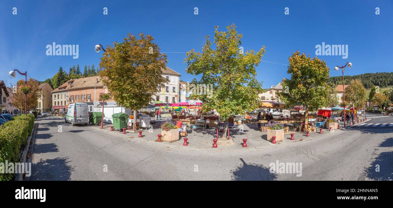 people at weekly local market in Seyne, France Stock Photo