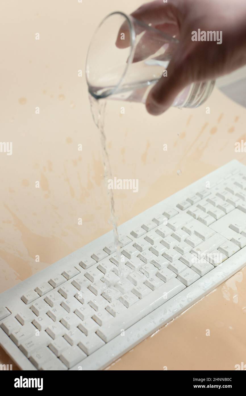 Keyboard in the water, waterproof keyboard, spilled water on the