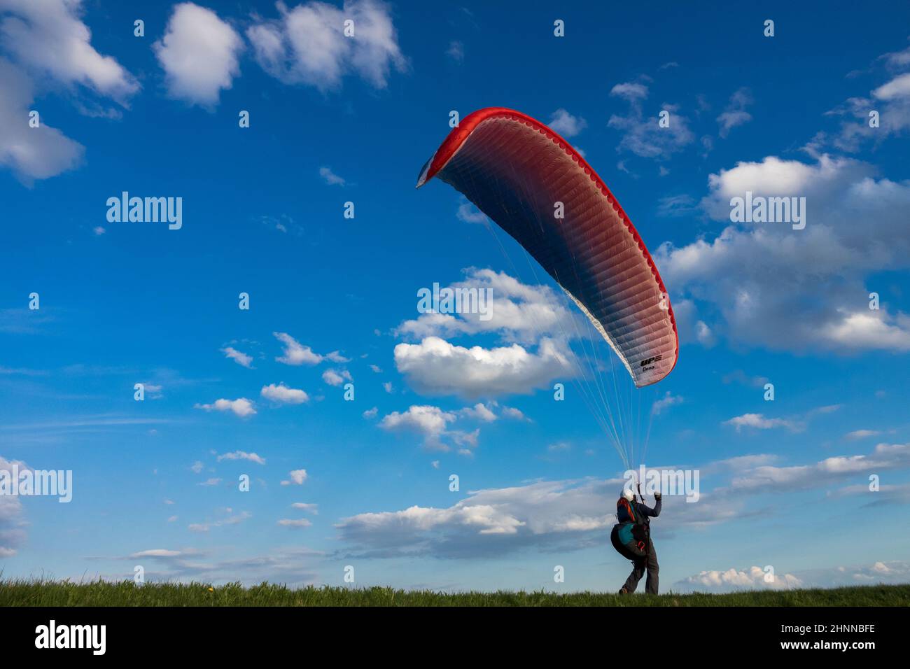 Paraglider inflating wing Stock Photo