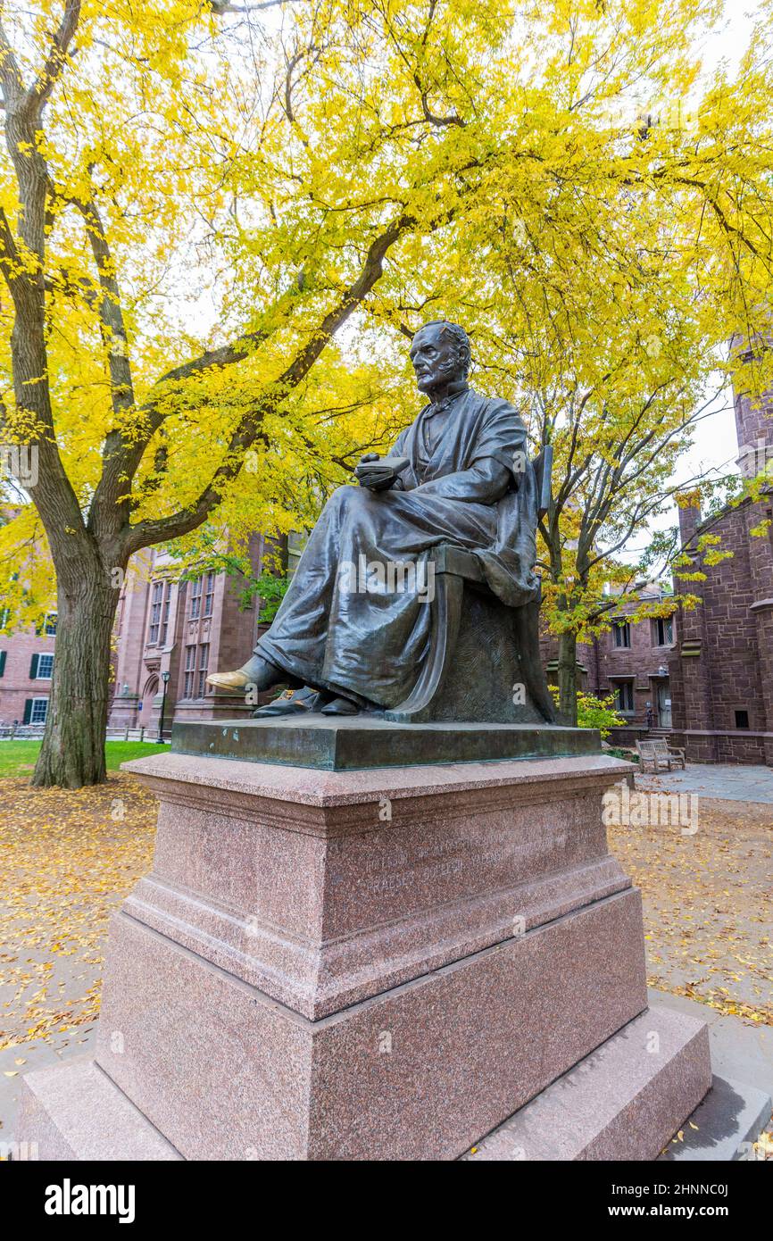 Theodore Dwight Woolsey statue and Phelps Hall on campus of Yale University on a sunny afternoon. Yale University is a Private Ivy League University in USA Stock Photo