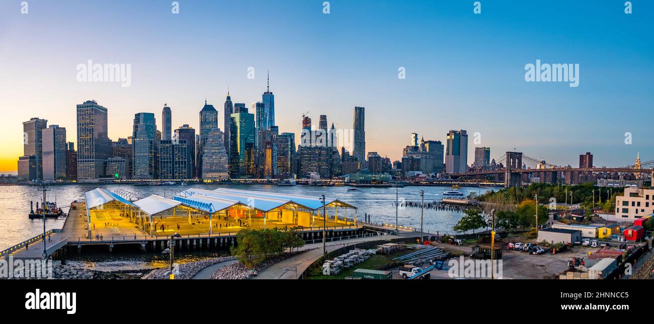 scenic view from Brooklyn harbor side to skyline of Manhattan, New York