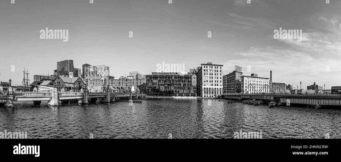 panorama of Boston skyline with Boston tea party ship and museum, old wharf area and modern buildings Stock Photo
