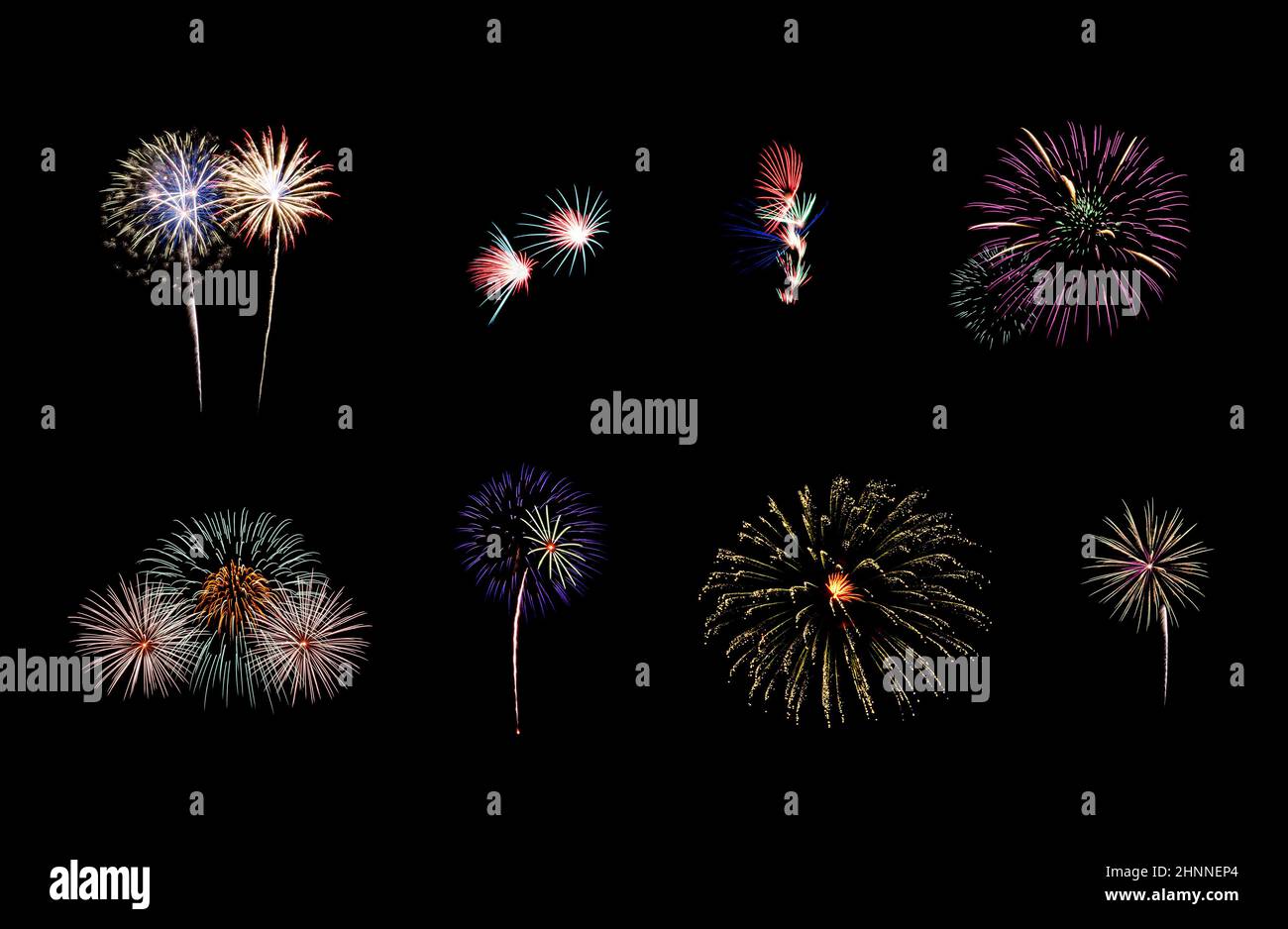 Collection of colorful festive eight fireworks exploding over night sky, isolated on black background Stock Photo