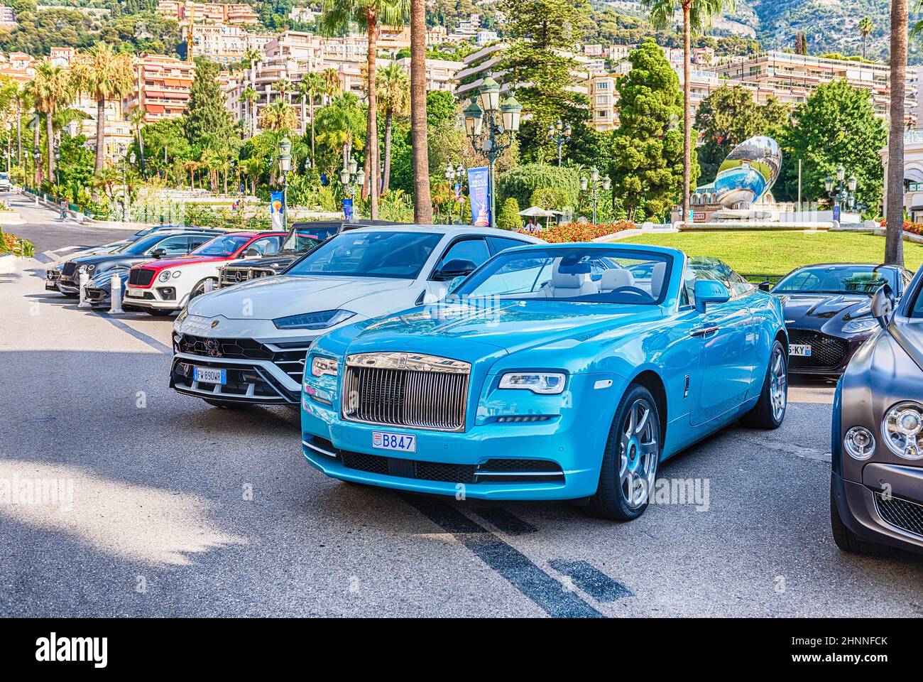 Luxury cars in Place du Casino, Monte Carlo, Monaco Stock Photo