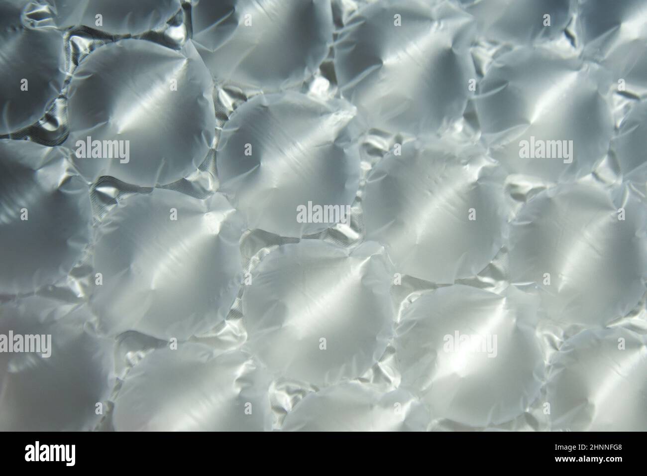 Air bags for packaging. Delivery from the online store in a box is well-packed, plastic pillows, plastic with air to protect products inside the air b Stock Photo