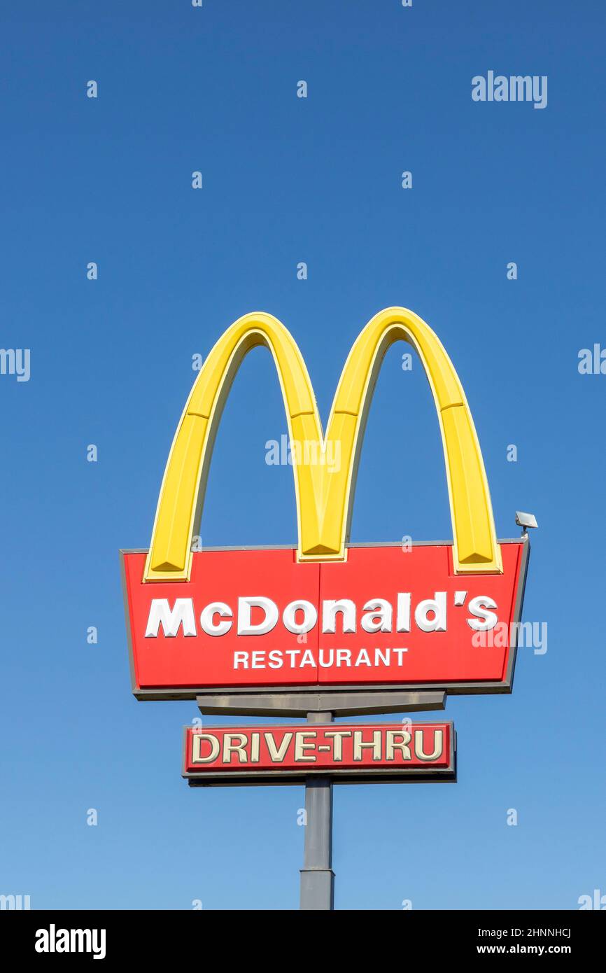 Mc Donald's sign under blue sky near Bridgeport, USA Stock Photo