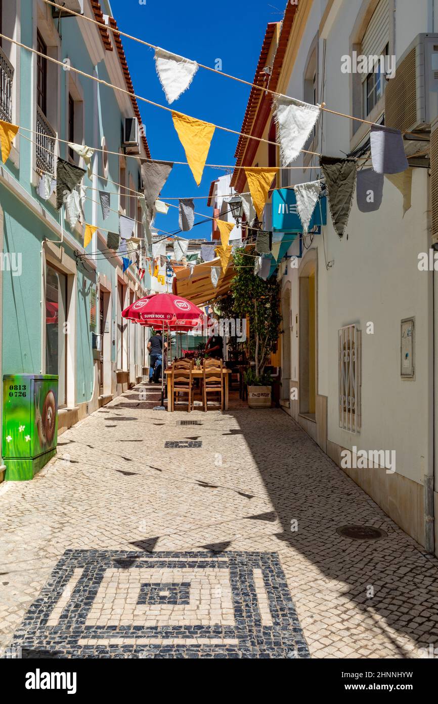 downtown view of old town of Silves with typical small portugese restaurants and shop Stock Photo