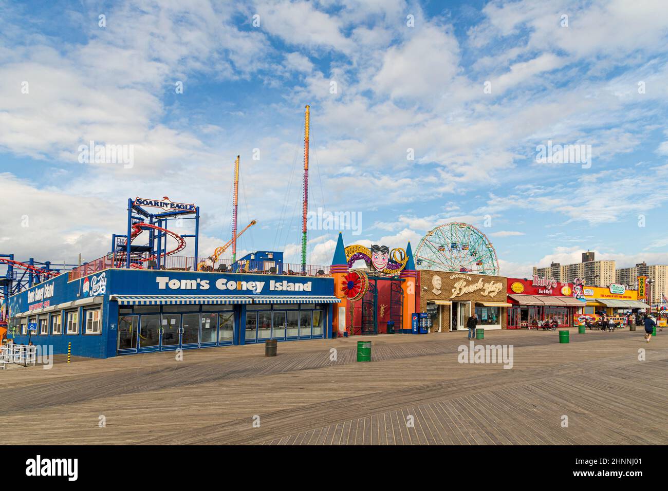 empty boardwalk in Coney island due to the closed shops in the Corona pandemic times Stock Photo