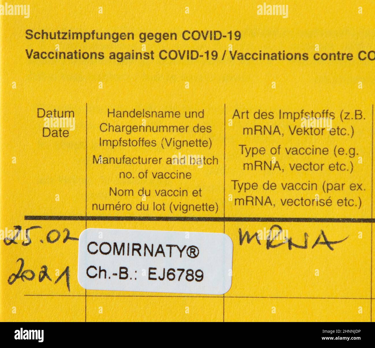 german vaccination book with documented comirnaty vaccination Stock Photo