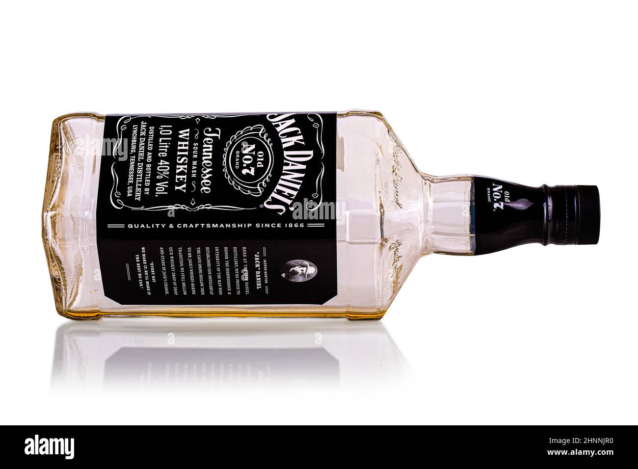 Empty bottle of Jack Daniel isolated on white background Stock Photo