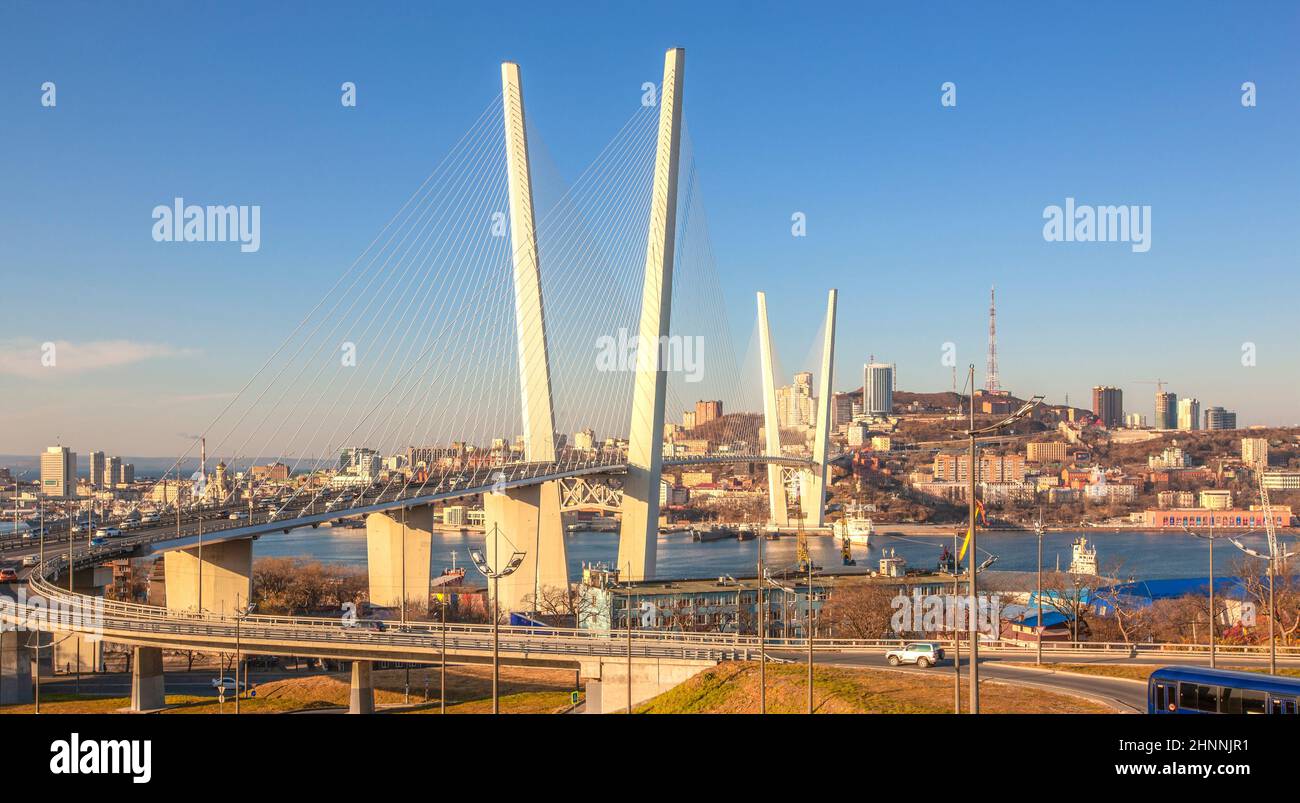 Golden bridge on sunny day in Vladivostok Stock Photo