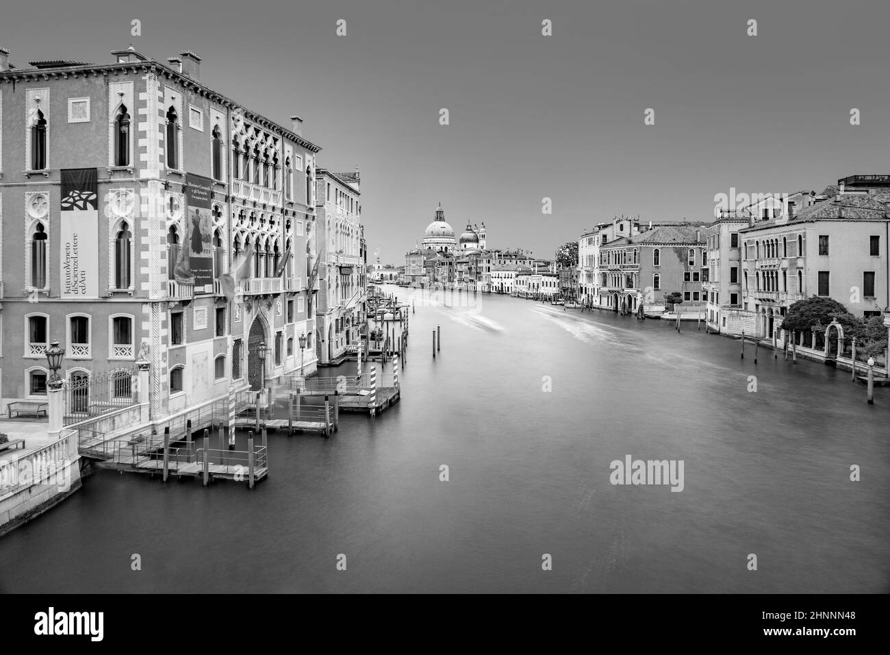 view from Rialto bridge to canale grande in Venice with blurred ships in motion, Italy Stock Photo
