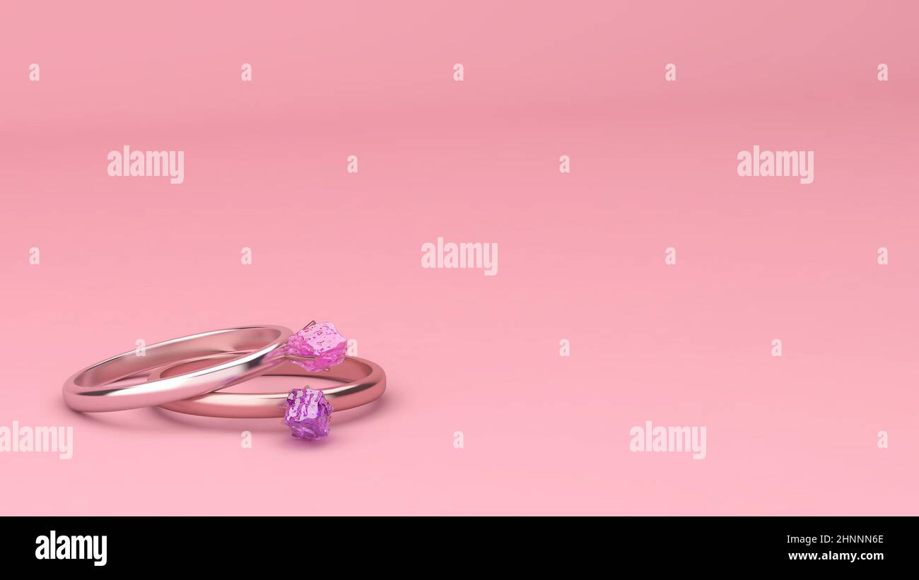 Two rings with precious stones diamonds on pink background, 3d illustration Stock Photo