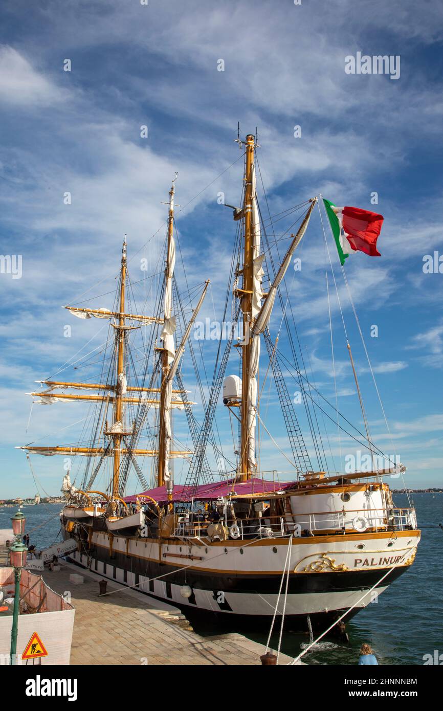 the italian navy ship Palinuro anchors at the pier of Venice at arsenal area Stock Photo