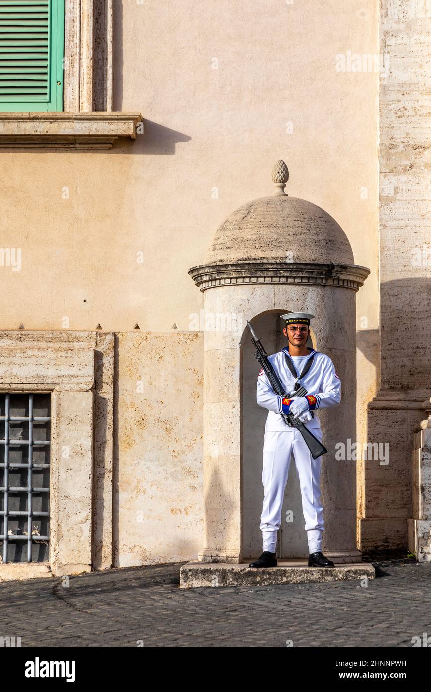 The Piazza del Quirinale with the Quirinal Palace and the guards in military uniform in Rome, Lazio, Italy Stock Photo