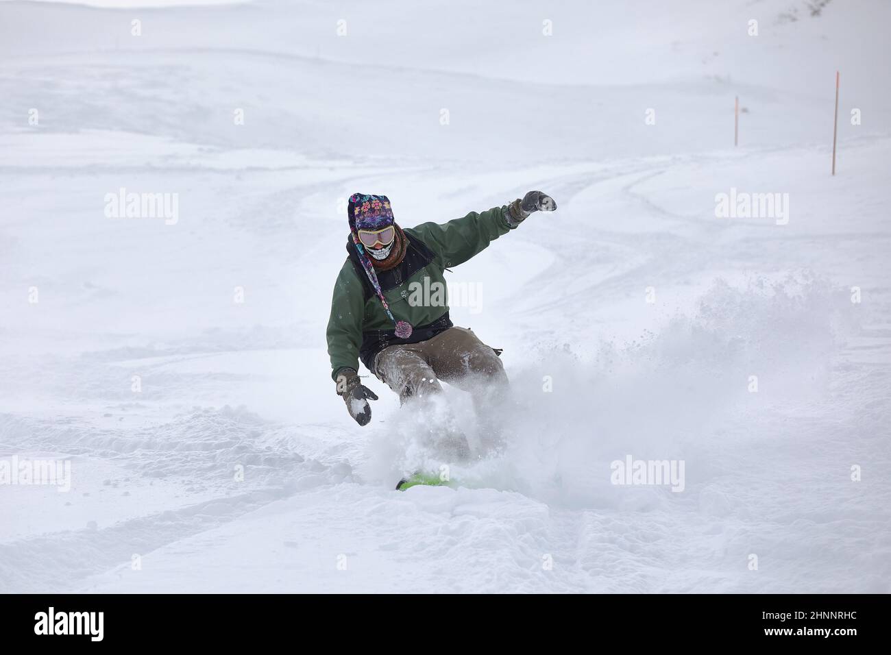 Snowboarding in fresh powder snow Stock Photo
