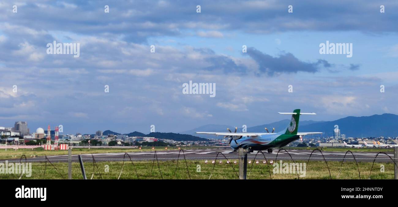 Airplane taxing at the Taipei Songshan Airport in Taipei, Taiwan Stock Photo