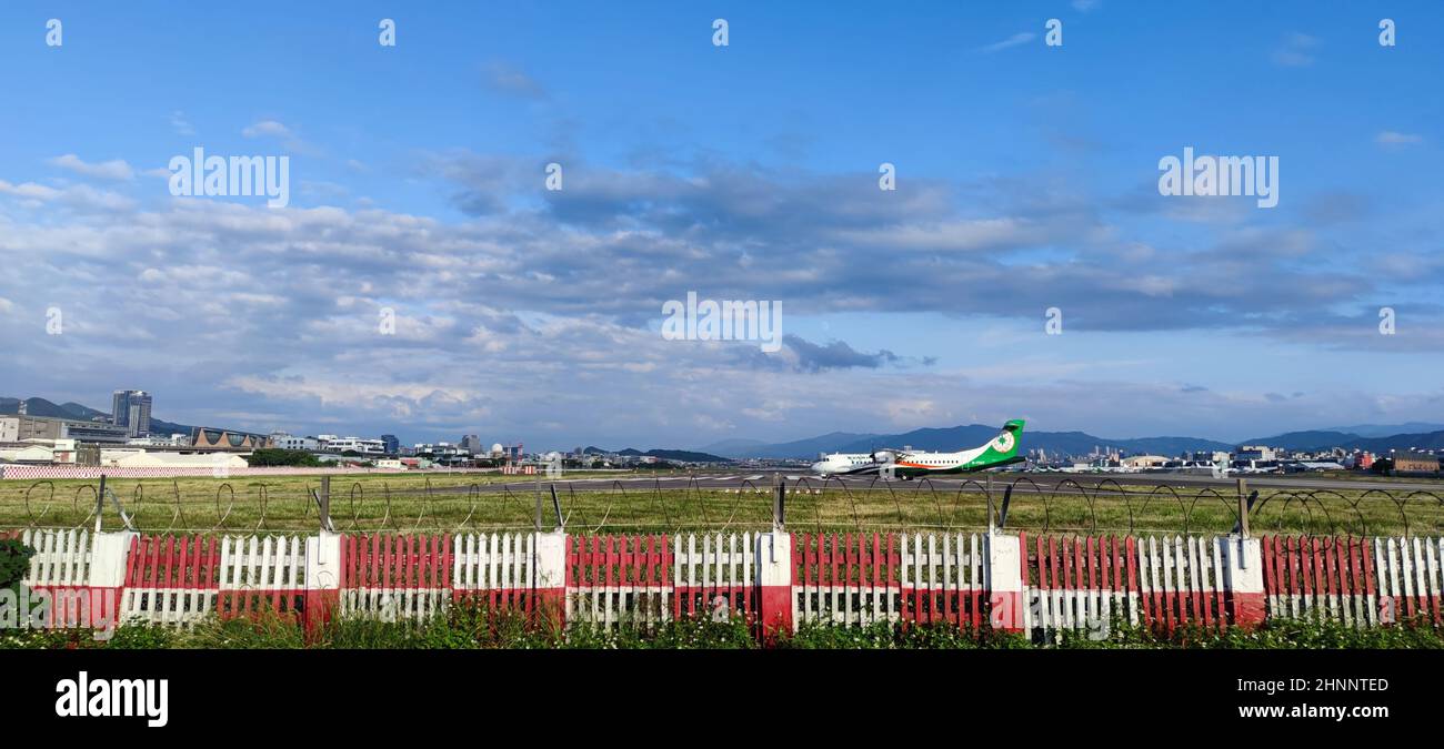 Airplane taxing at the Taipei Songshan Airport in Taipei, Taiwan Stock Photo