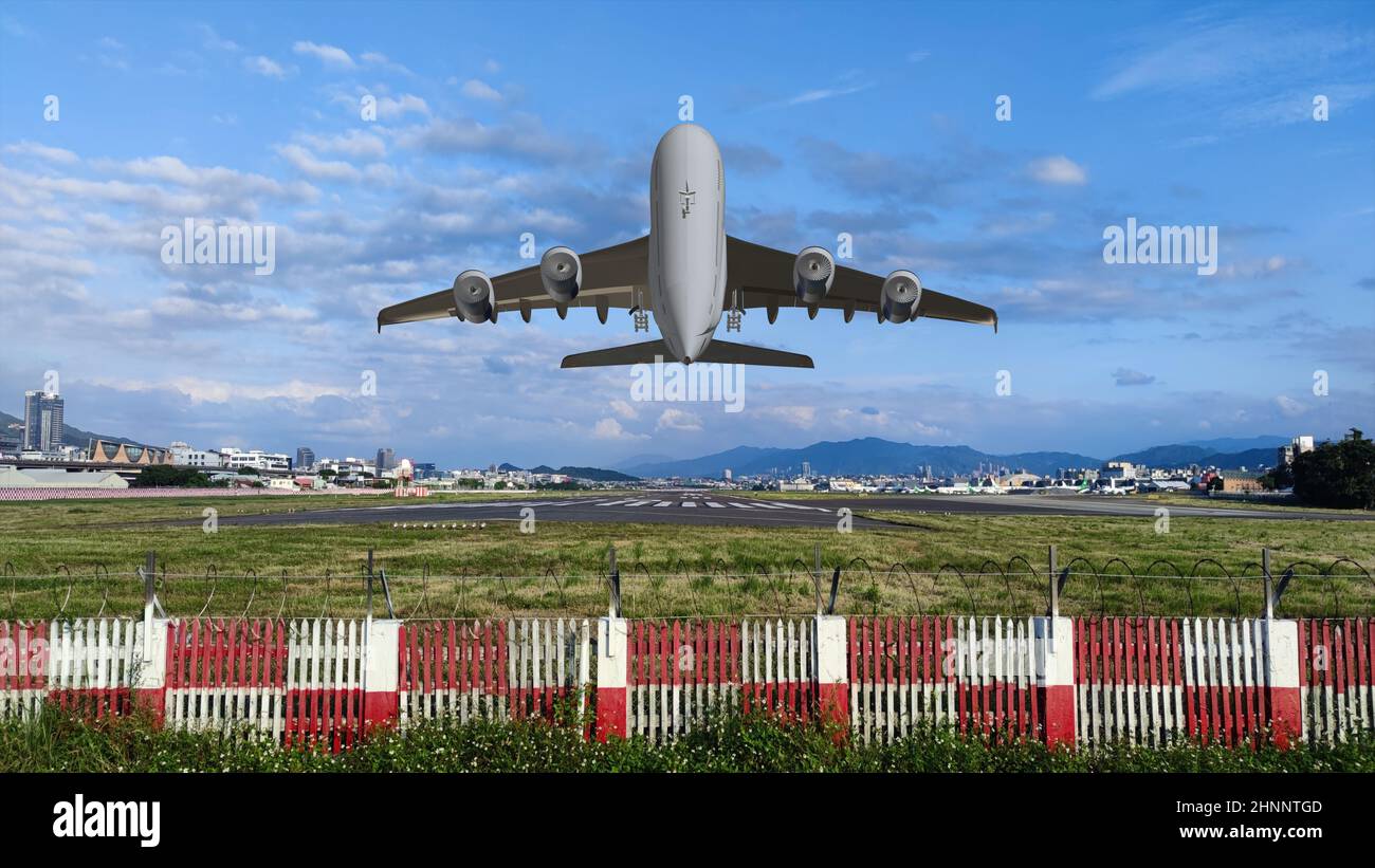 Airplane taxing at the Taipei Songshan Airport in Taipei, Taiwan. Stock Photo