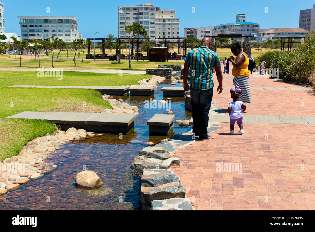 Green Point Park lake panorama with family in Cape Town. Stock Photo