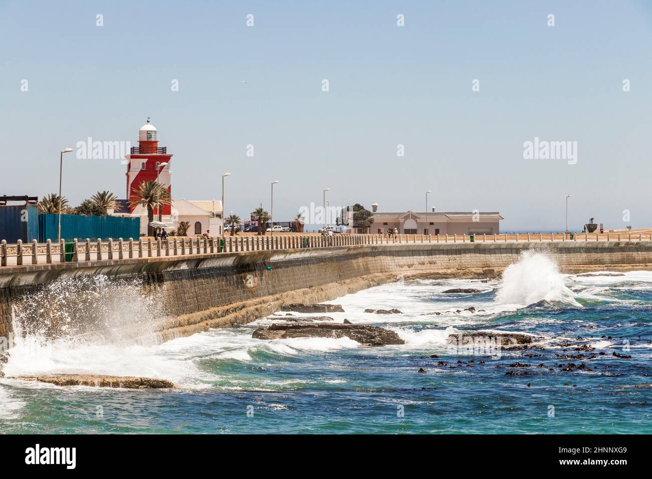 Waves bounce against wave protection, breakwater, Sea Point Cape Town. Stock Photo