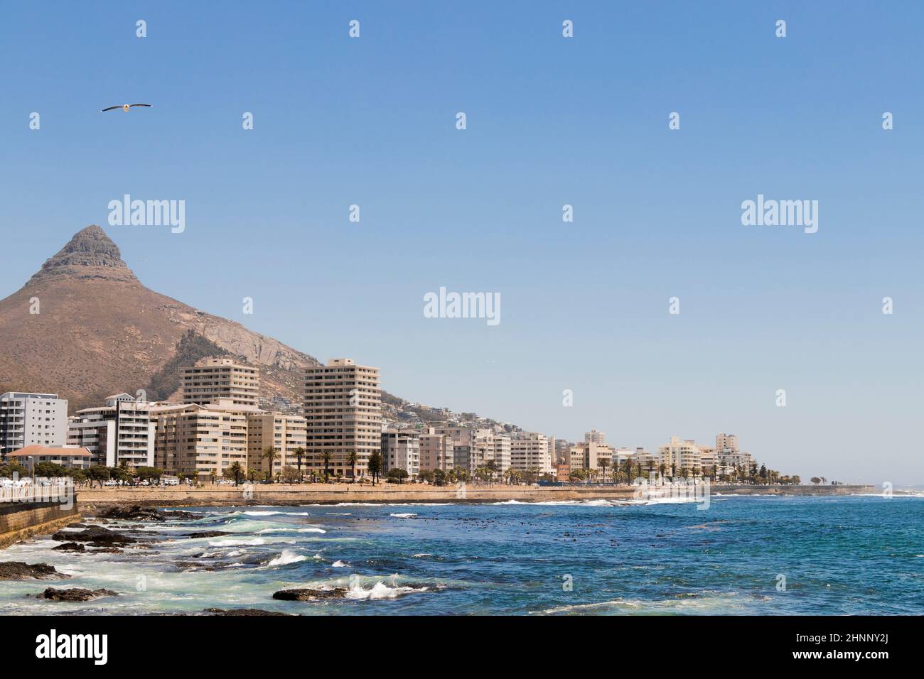 Waves and mountains, Sea Point, promenade Cape Town South Africa. Stock Photo