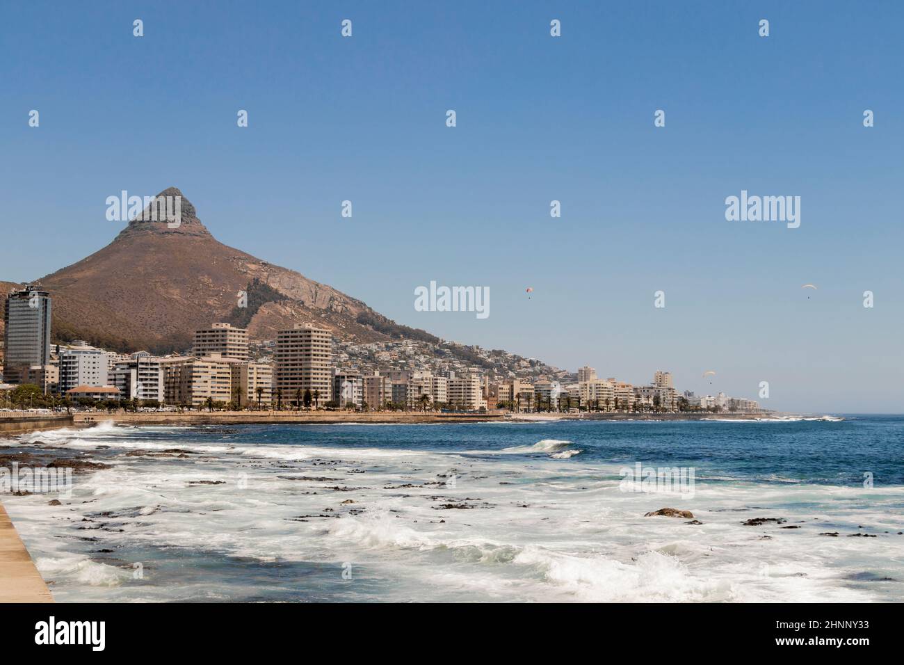Waves and mountains, Sea Point, promenade Cape Town South Africa. Stock Photo