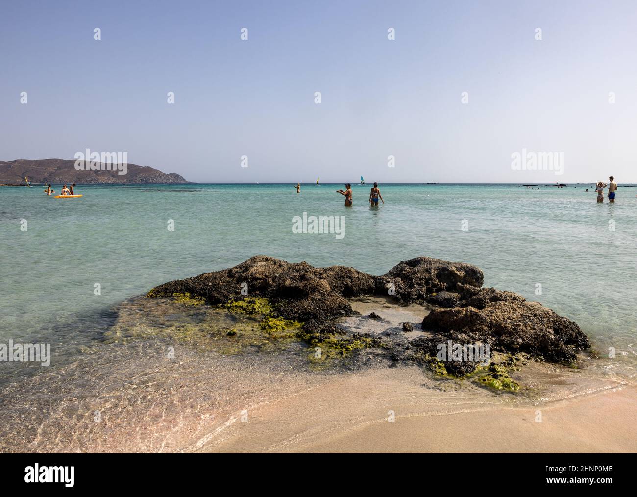 People relaxing on the famous pink coral beach of Elafonisi on Crete Stock Photo
