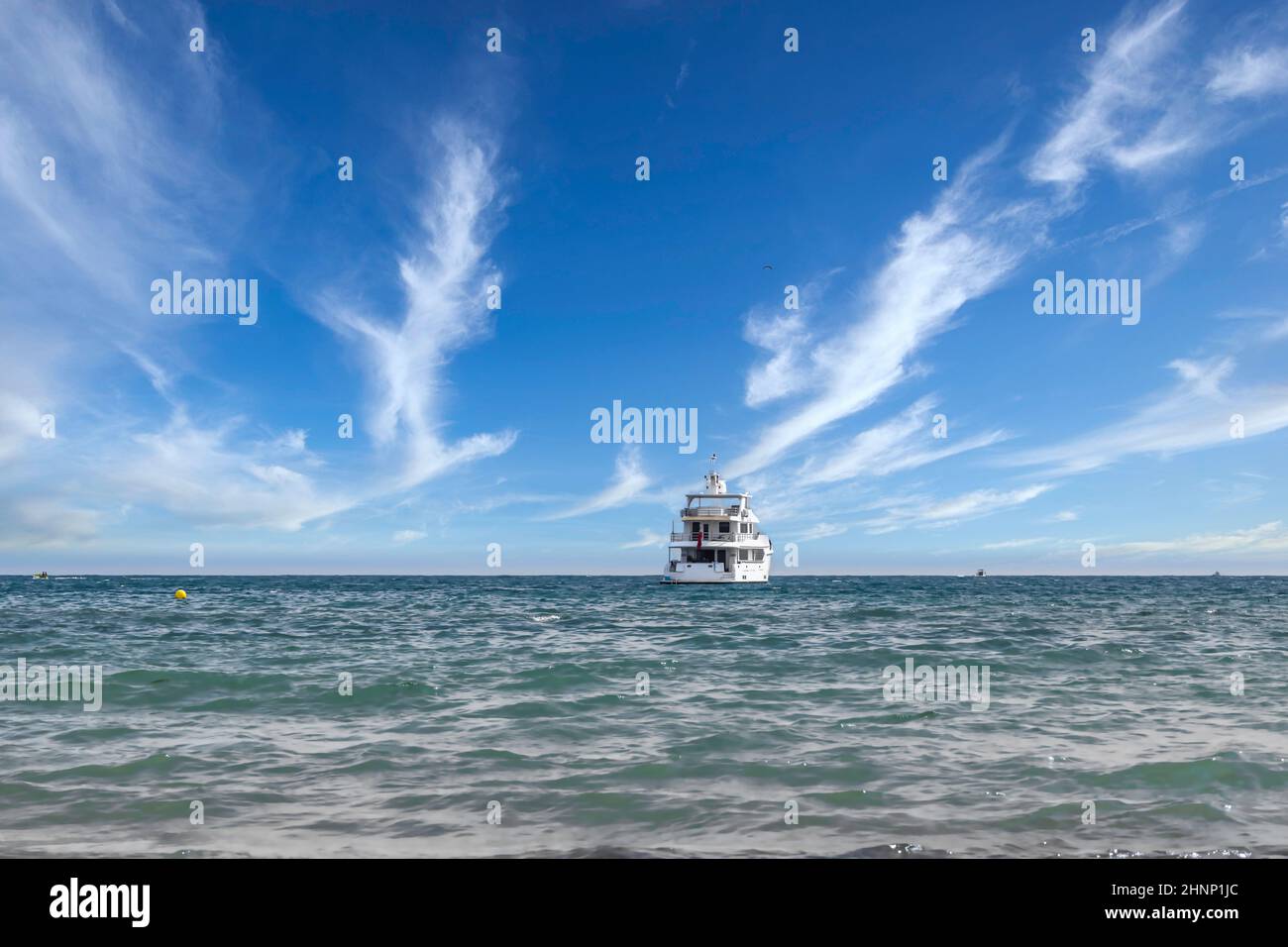 sailing boats on the seashore and clear blue sky Stock Photo - Alamy