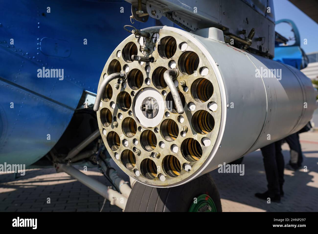 Military combat helicopter side gun or cannon, detail view from behind with tube holes for ammunition Stock Photo
