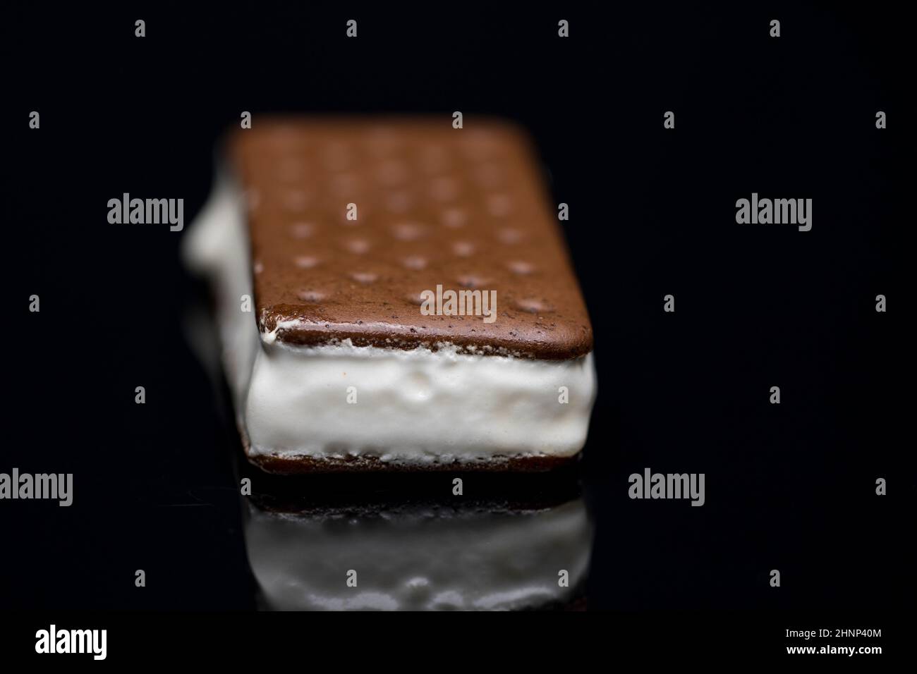 Ice cream sandwich food photography black background. Close up ice cream sandwich dessert. Stock Photo
