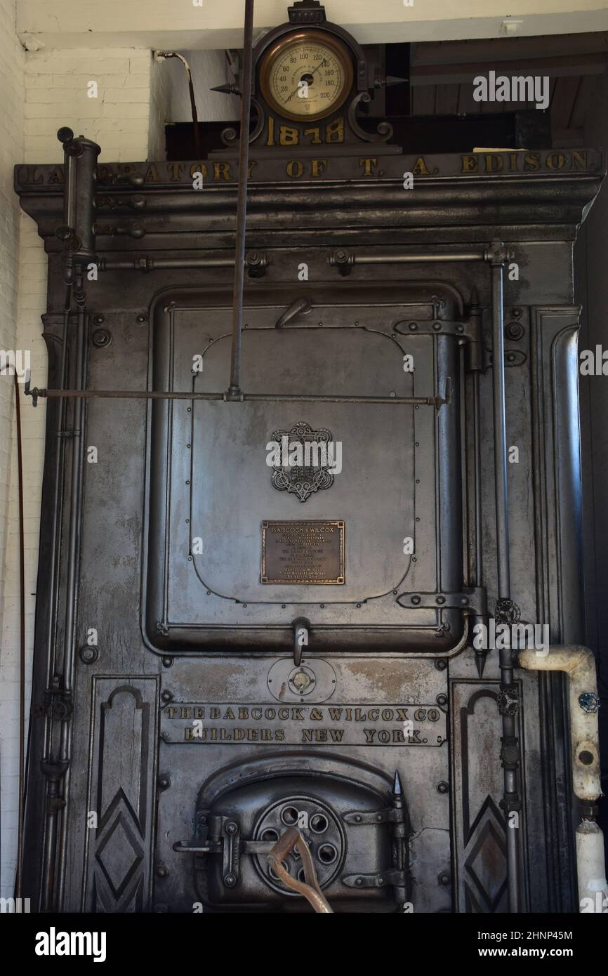 A steam boiler at the Menlo Park Machine Shop at Greenfield Village, an 80-acre open air site part of the Henry Ford museum complex in Dearborn, MI Stock Photo