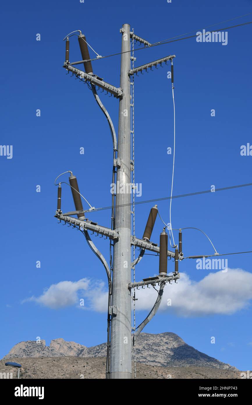 High voltage pylon with overhead lines in Spain Stock Photo