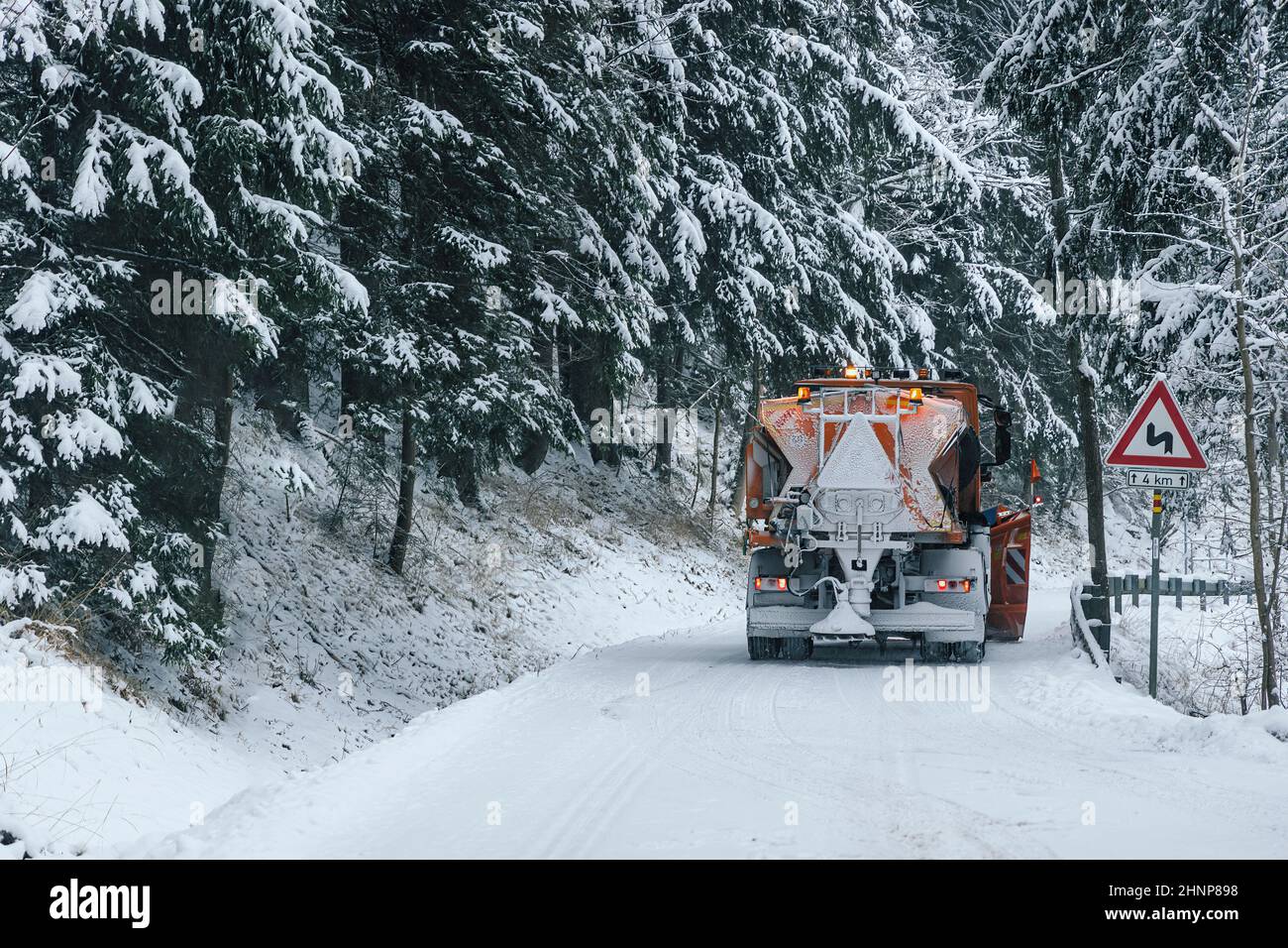Maintenance roud in winter, truck cleaning snow from road Stock Photo