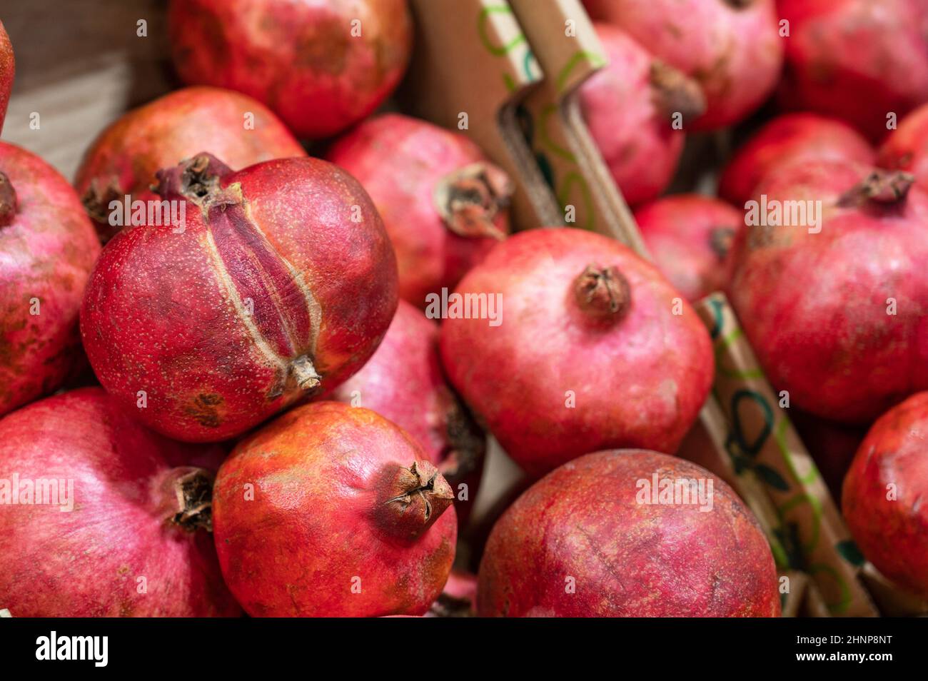 Pomegranate at fruit market Stock Photo Alamy