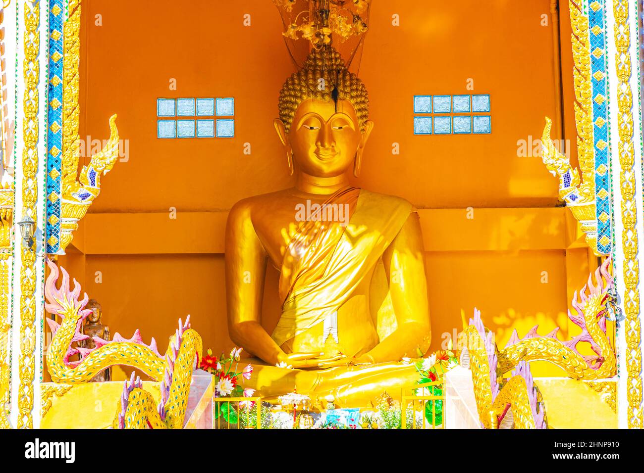 Golden Buddha Wat Phadung Tham Phothi temple Khao Lak Thailand. Stock Photo