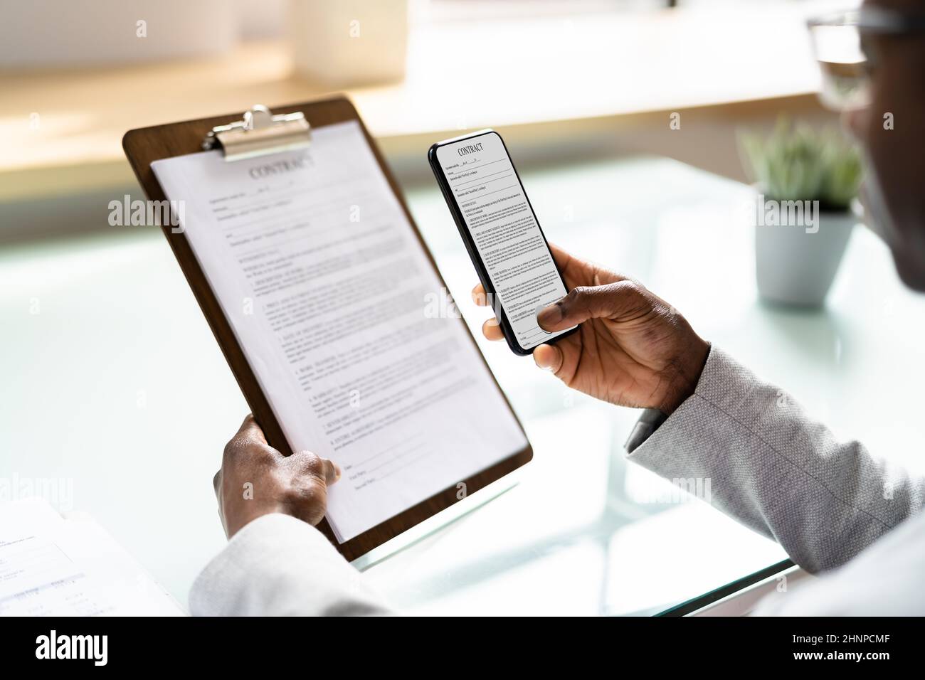 Taking Document Picture Using Phone Or Smartphone Stock Photo