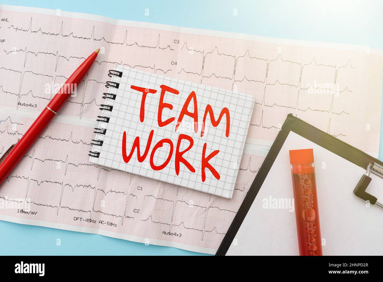 Sign displaying Team Work. Conceptual photo Combined action of a group Workgroup cooperation collaboration Reading Graph And Writing Important Medical Notes Test Result Analysis Stock Photo