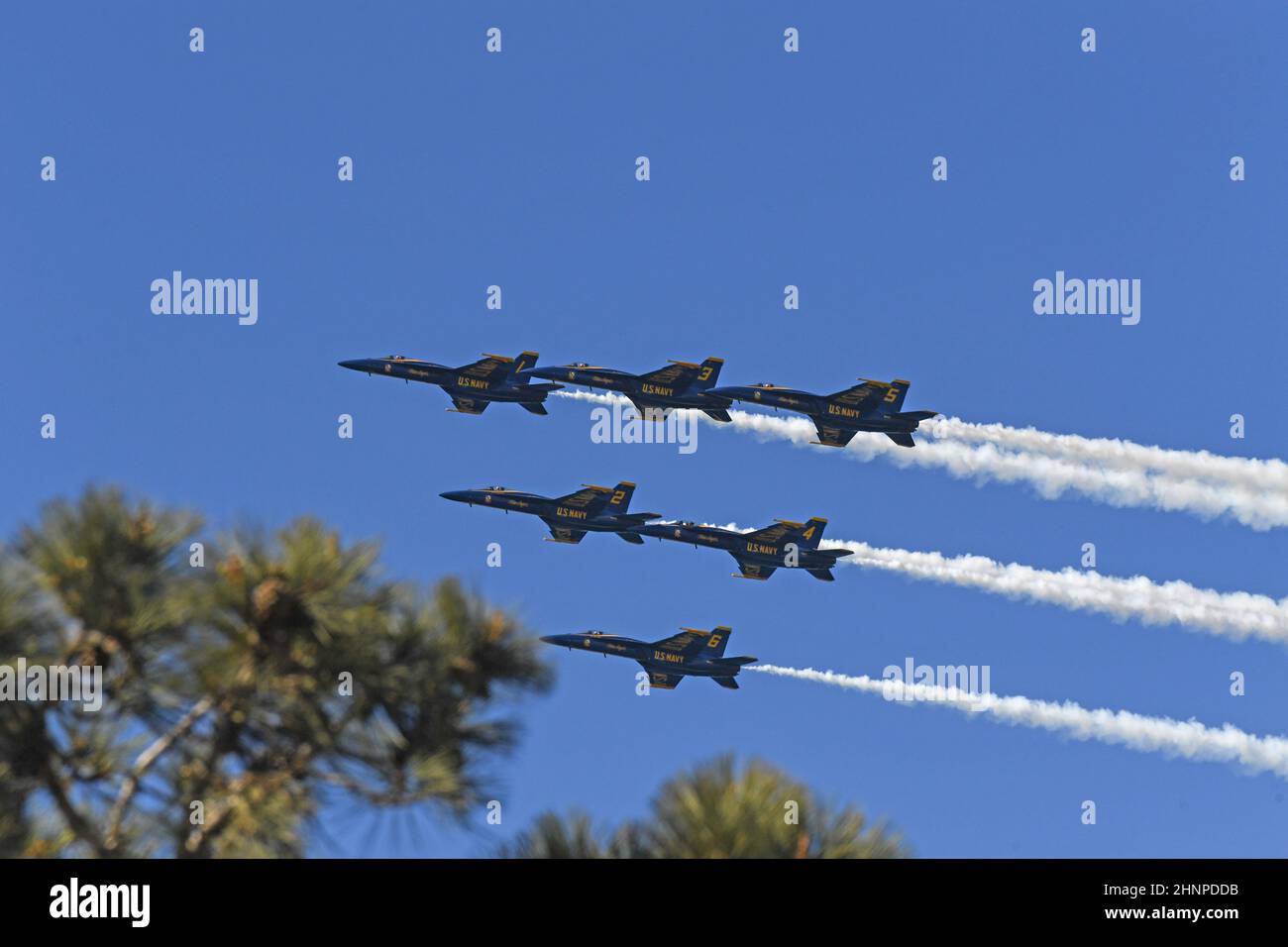 U S Navy Blue Angels Delta formation passes over Cabrillo National Monument / Point Loma following flyover of USS Carl Vinson (CVN 70) in San Diego. Stock Photo