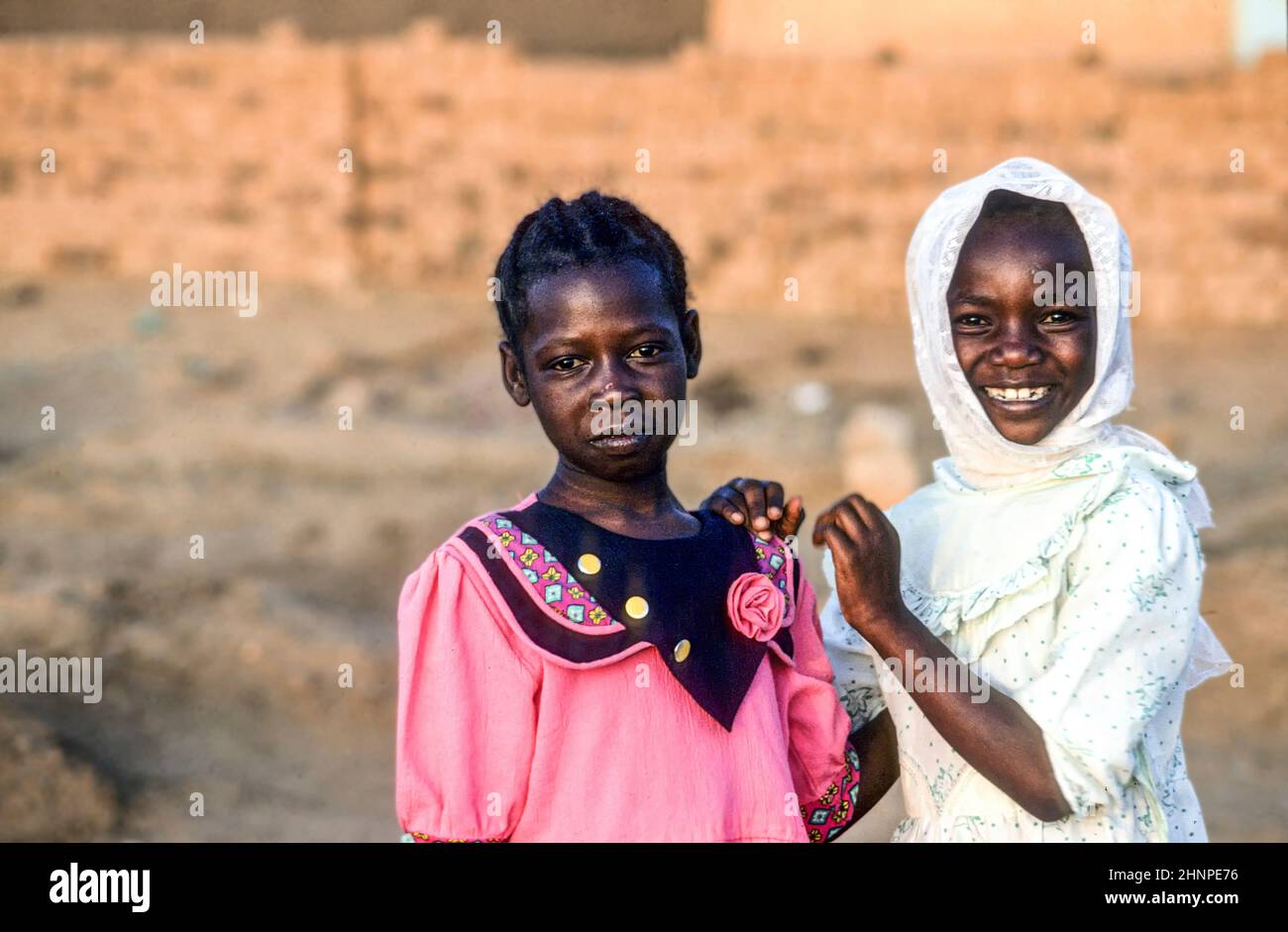 girls pose for a photo in their best clothes in Omdourman near Khartoum, Sudan Stock Photo