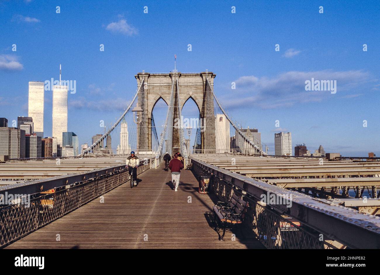 brooklyn bridge in New York with twin towers in background Stock Photo