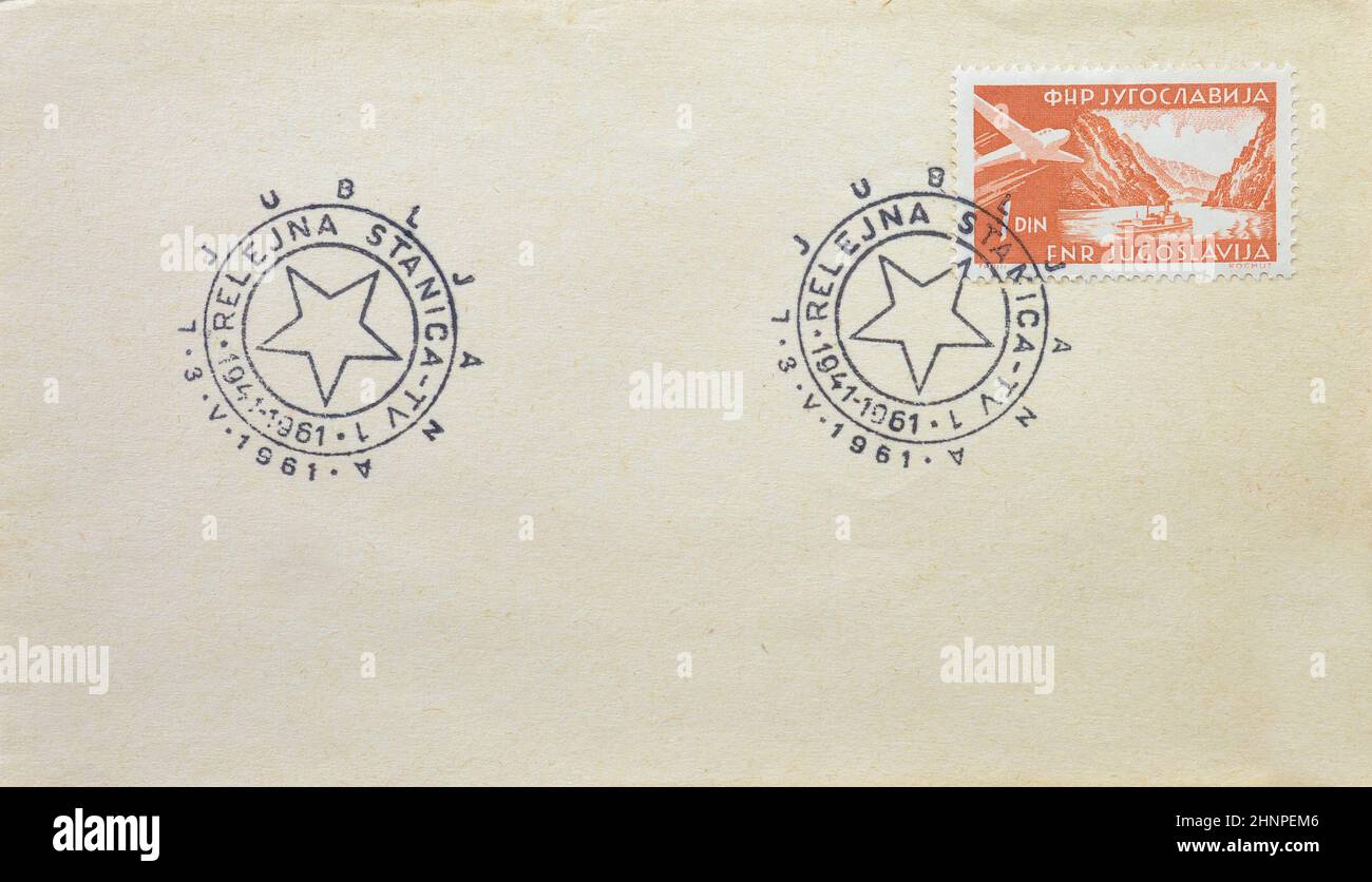 Letter with cancelled stamp printed by Yugoslavia, that shows Danube breakthrough at the Iron Gate, and stamp promoting 20th anniversary of Relay Stat Stock Photo