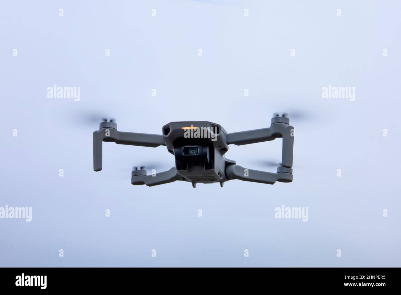 Quadcopter in flight shooting evening hi-res stock photography and ...