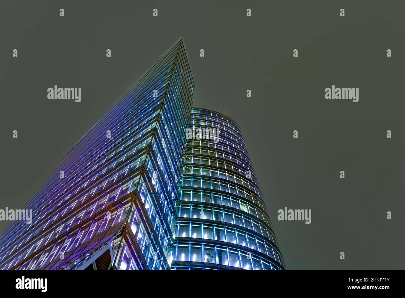 facade of uniqa tower in Vienna by night Stock Photo