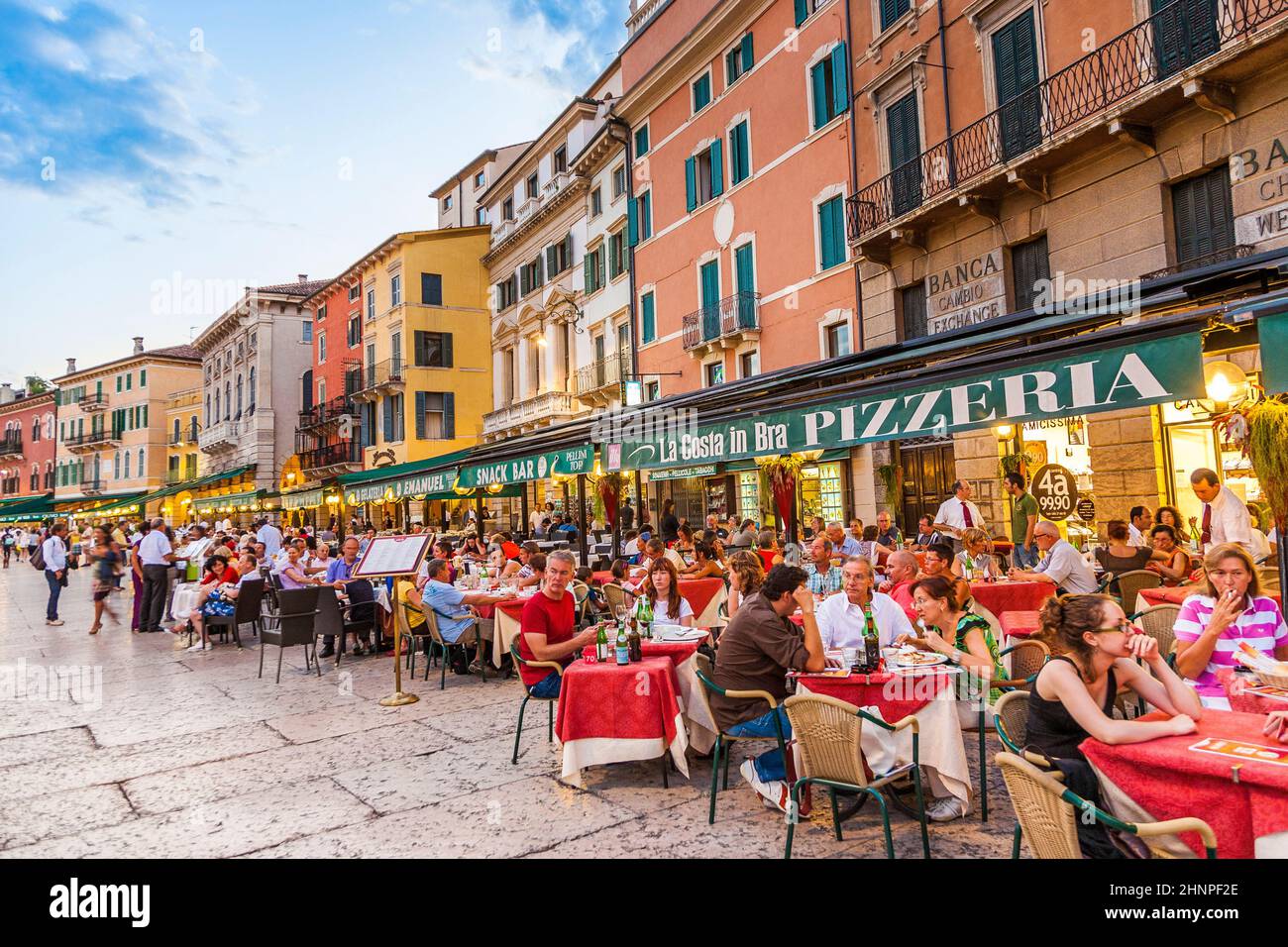 people enjoy the restaurants at plaza Bra before joining the spectacle in the arena di verona Stock Photo